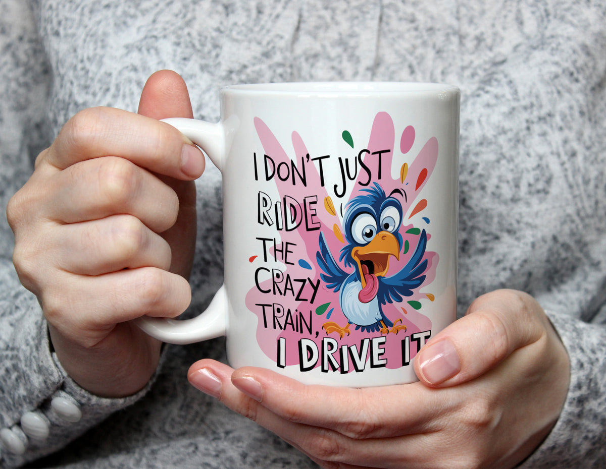 I Don't Just Ride the Crazy Train, I Drive It - Funny Cartoon Mug - White